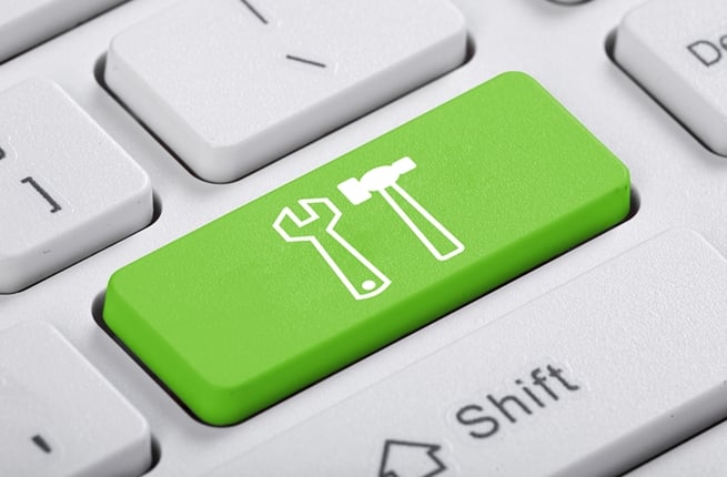 tecla verde con íconos de herramientas