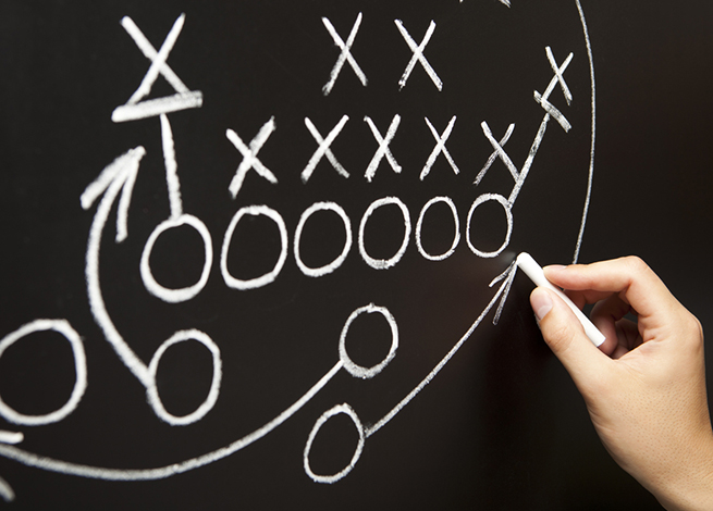 Pizarra con una estrategia para fútbol americano.