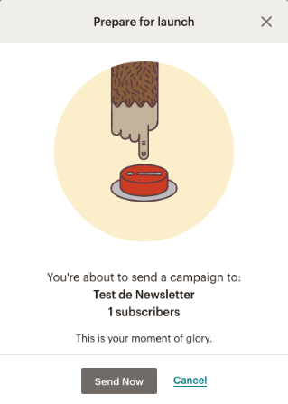 Captura de pantalla del mensaje de "Prepare to launch" en Mailchimp, con una mano a punto de presionar un botón rojo.