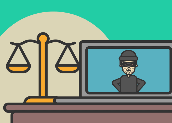 Balanza y jacker informatico en una mesa.