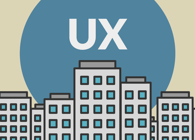 Una ciudad con letras UX en el cielo.