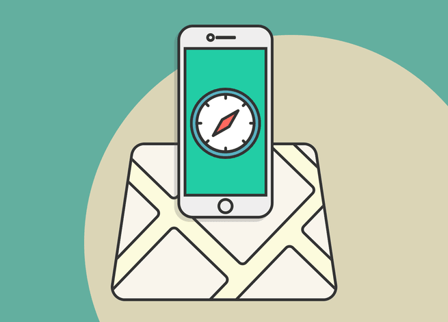 Un mapa con un celular que muestra una brújula.