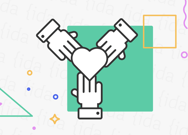 Manos que se unen alrededor de un corazón, lo que hace referencia al valor de la inclusión.