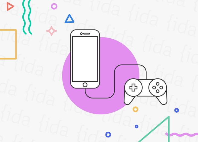 joystick conectado a un celular que hace referencia a la gamificación en estos dispositivos.