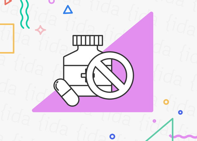 Píldoras que hacen referencia a la Ivermectina junto a un signo que indica que no deben consumirse.